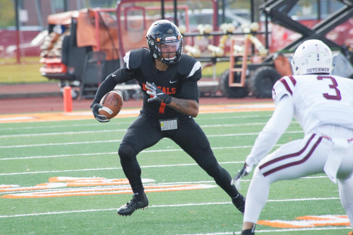 Bengals football player holding the ball