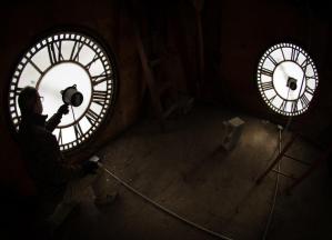 Shot taken inside the Rockwell Hall bell tower showing the lighted clock faces