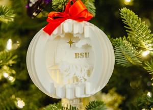 Buffalo State University ornament hanging on a tree