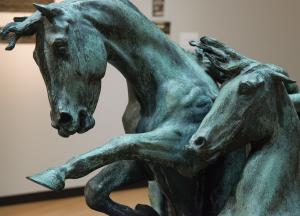 Scupture of two horses cast in patinaed bronze