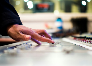 Person using a sound mixer