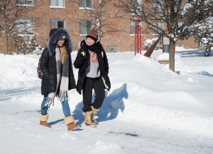 Students walking on campus in snow