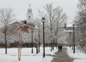 Distant view of Rockwell Hall bell tower and a snow covered campus